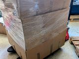 a large box sitting on top of a pallet in a warehouse