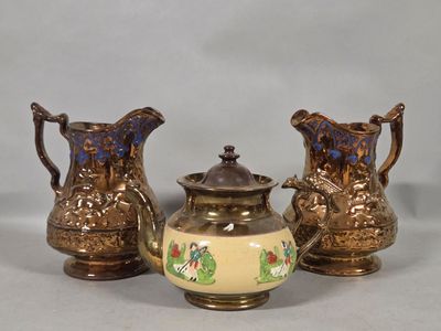three different types of vases sitting on a table