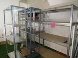 a room with a shelf and shelves in it