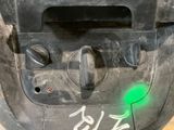 a close up of a parking meter with a green light on it