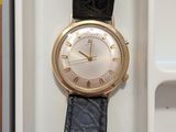 a watch that is sitting in a box on the table