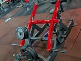 a gym with a lot of exercise equipment in it