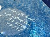 a blue plate with writing on it that says happy birthday