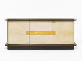 a white and black chest with a gold plated handle