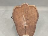 a piece of wood that has been cut in half