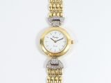 une image représentant une montre en or et diamants sur fond blanc