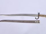 pair of two old swords on a white surface