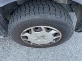 a close up of a tire on a vehicle