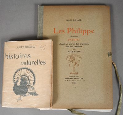 two books sitting on top of a table next to each other