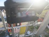 a close up of a control panel on the back of a motorcycle