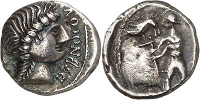 a close up of a silver coin with a man on it