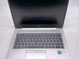 a laptop computer that is sitting on a table
