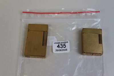two lighters in a bag on a table