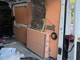 a van that has been vandalized and is in the process of remodeling