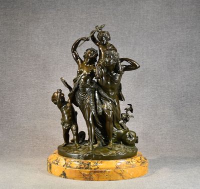 a bronze statue of a woman and two children on a marble base