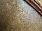 a close up of a piece of furniture with a brown leather cover