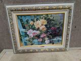 une photo d'un tableau représentant des fleurs, dans un cadre