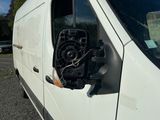 a white van that has a fan in the side of it