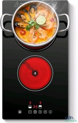 une photo d'une casserole de nourriture en train de cuire sur la cuisinière