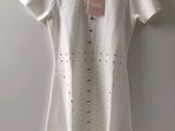 white t - shirt with holes and holes on the front