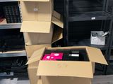several cardboard boxes stacked on top of each other in a room