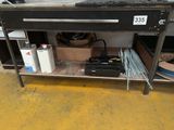 an image of a workbench with a lot of tools on it