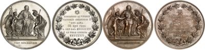 four oval metal plaques with images of jesus and other religious figures