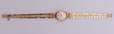 an image of a gold watch with a white face on a white surface
