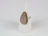 a ring with a tear shaped stone in the middle of it