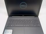 the dell laptop is open and ready to be used