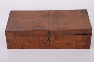 an old wooden box with a lock on it
