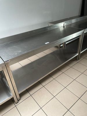 Table inox entretoisée et à dosseret de 180 - Photo 1