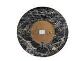 a black and gold plate with a clock on it