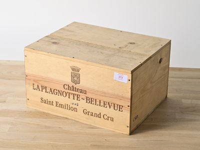 a wooden box with a label on it on a table