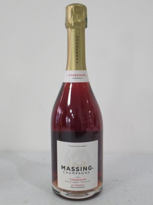 a bottle of wine that is sitting on a table
