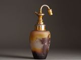an image of a bottle with a bird on it