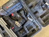 a tool box with tools in it and a pair of shoes