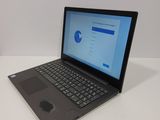a laptop computer that is sitting on a table