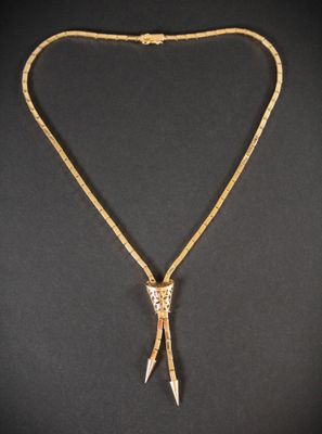 Collier négligé en or rose 750°°° (têtes d'aigle et rhinocér…