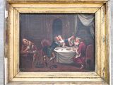 painting of a group of people eating at a table in a room