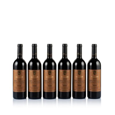 six bottles of red wine lined up on a white surface