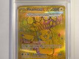 a close up of a pokemon card in a plastic case