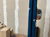 a picture of a fork lift with a box on it