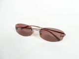 sunglasses on a white surface with a white background