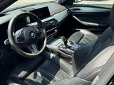 the interior of a car with a steering wheel and a dashboard