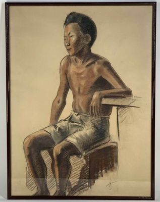 VIETNAM Années 50 : Jeune homme assis.