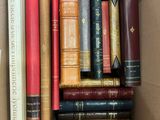 a box full of books that are sitting on a table