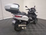 a motorcycle that is parked in a room
