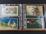 four cards in a binder on a table