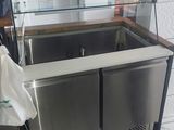 a counter with a glass top in a kitchen